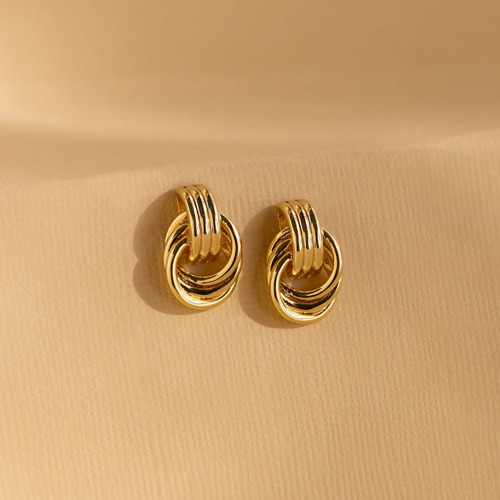 Knot earrings made of EVA foam.