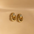 Knot earrings made of EVA foam.
