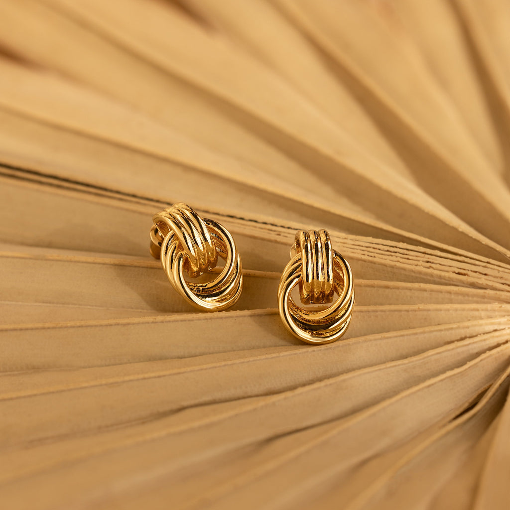 Knot earrings made of EVA foam.
