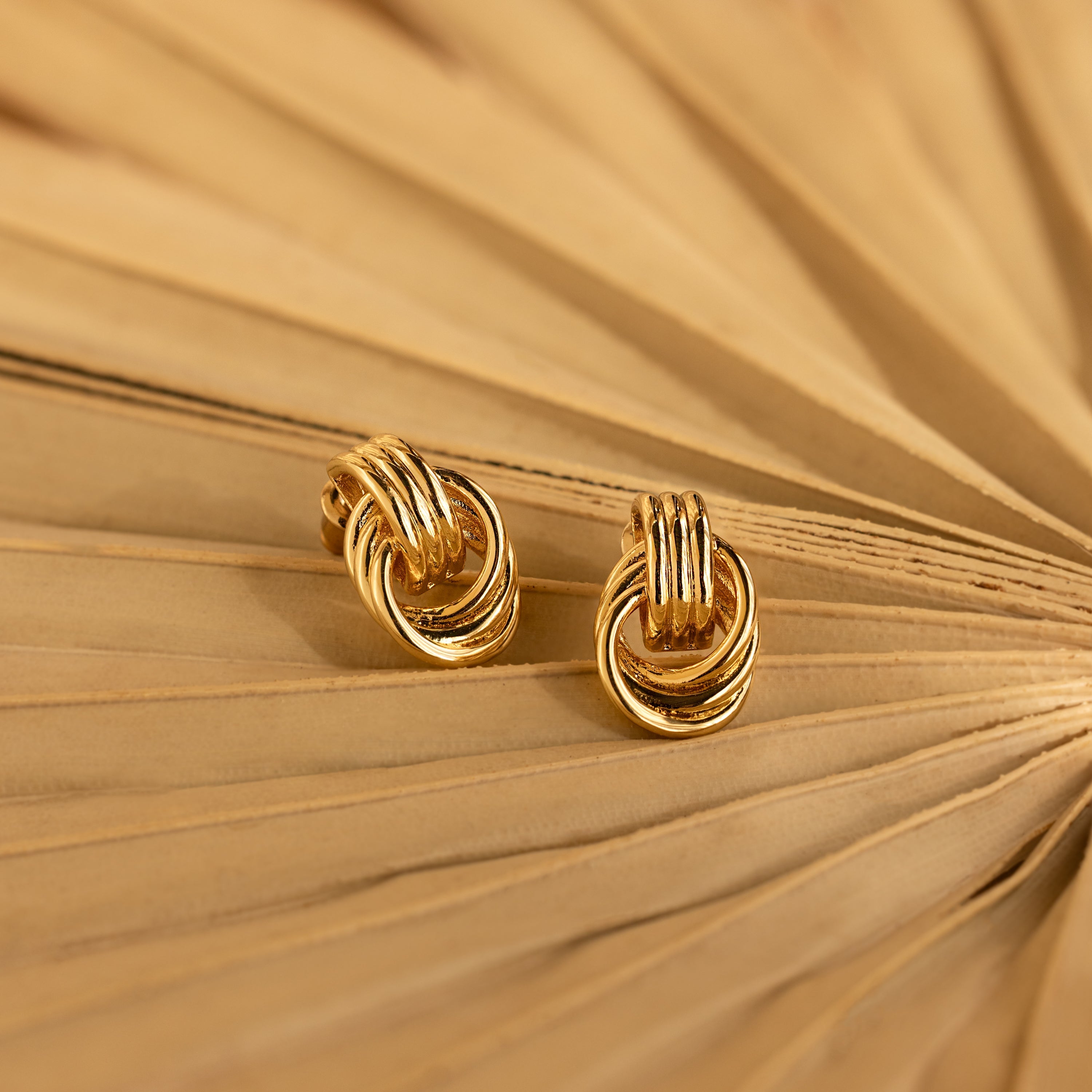 Knot earrings made of EVA foam.