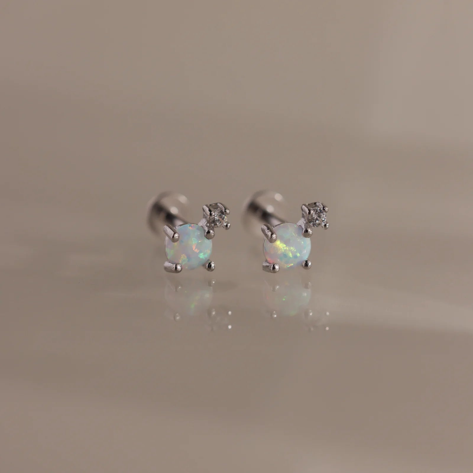 Harmony earrings with opal and diamond.