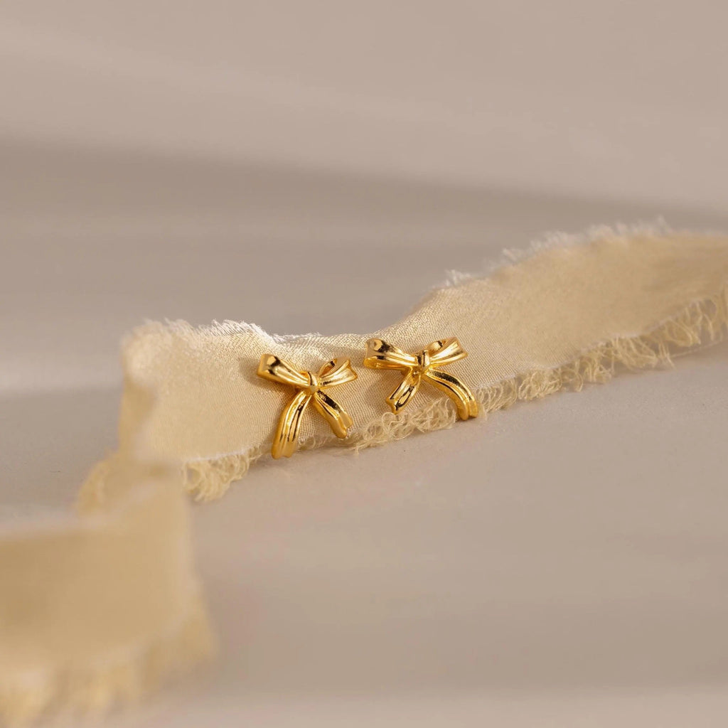 Delicate bow earrings