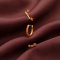 Set of colorful earrings with sparkling stones.
