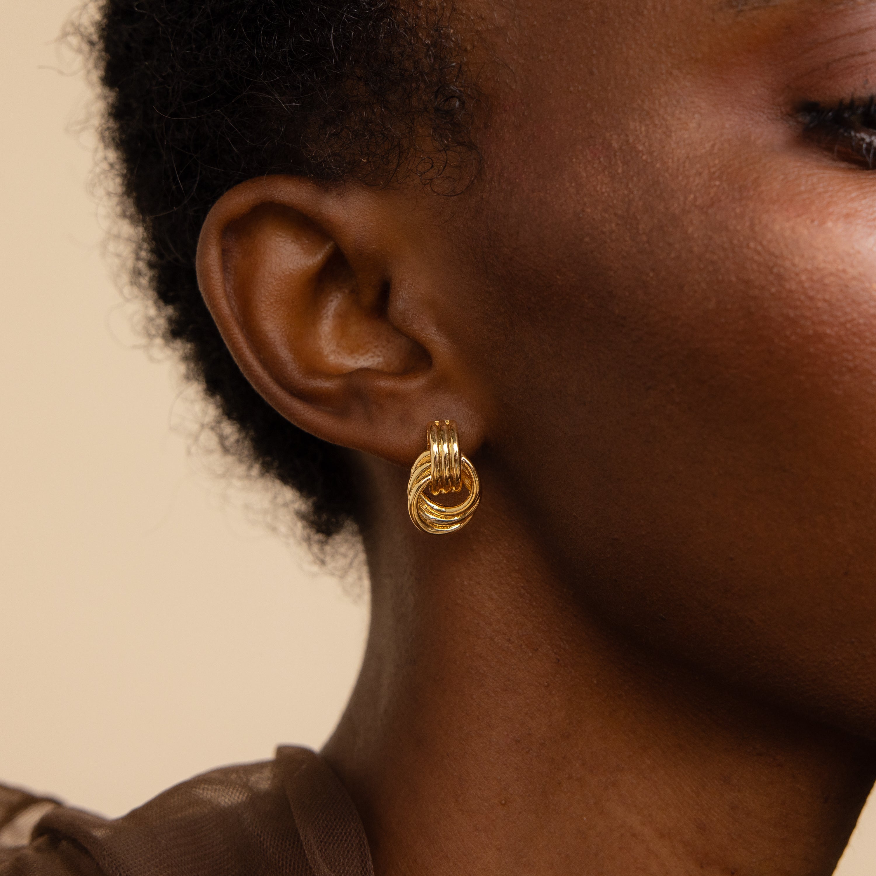 Knot earrings made of EVA foam.