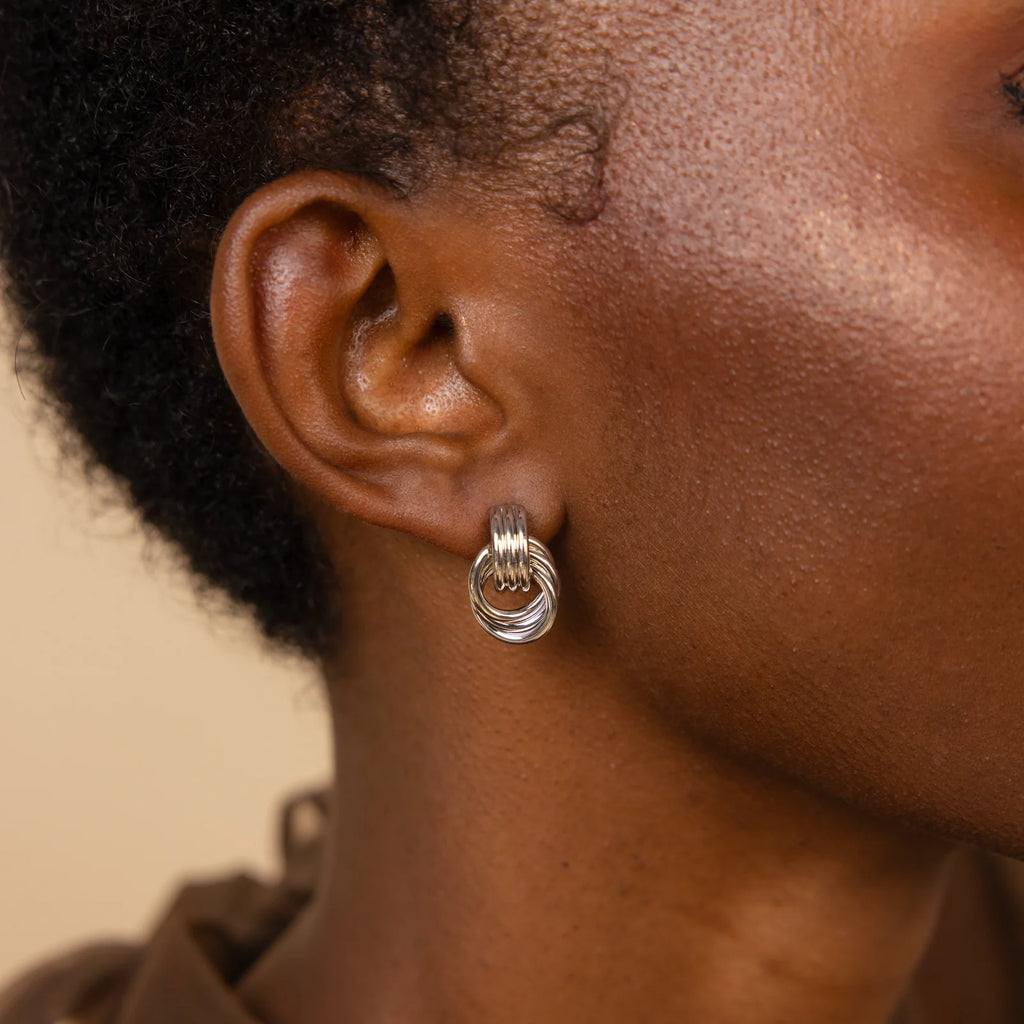 Knot earrings made of EVA foam.