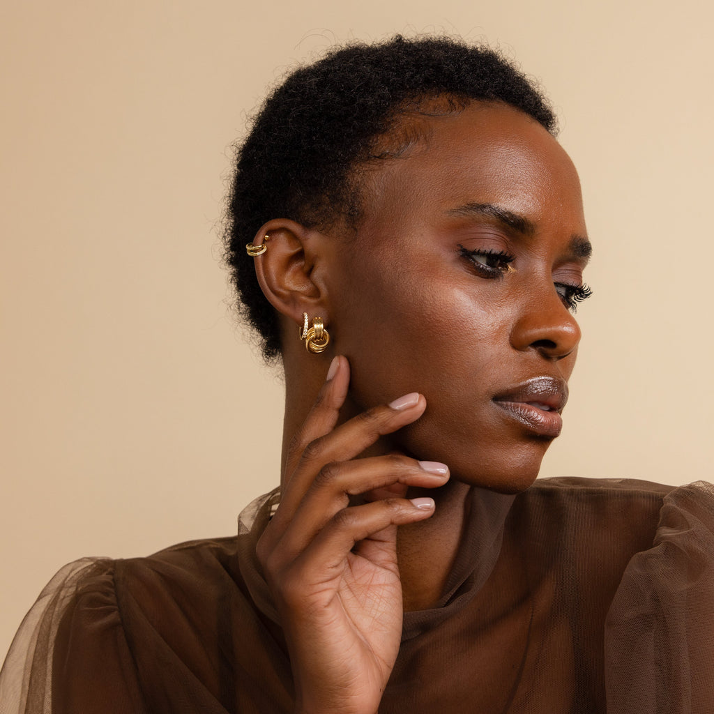Knot earrings made of EVA foam.
