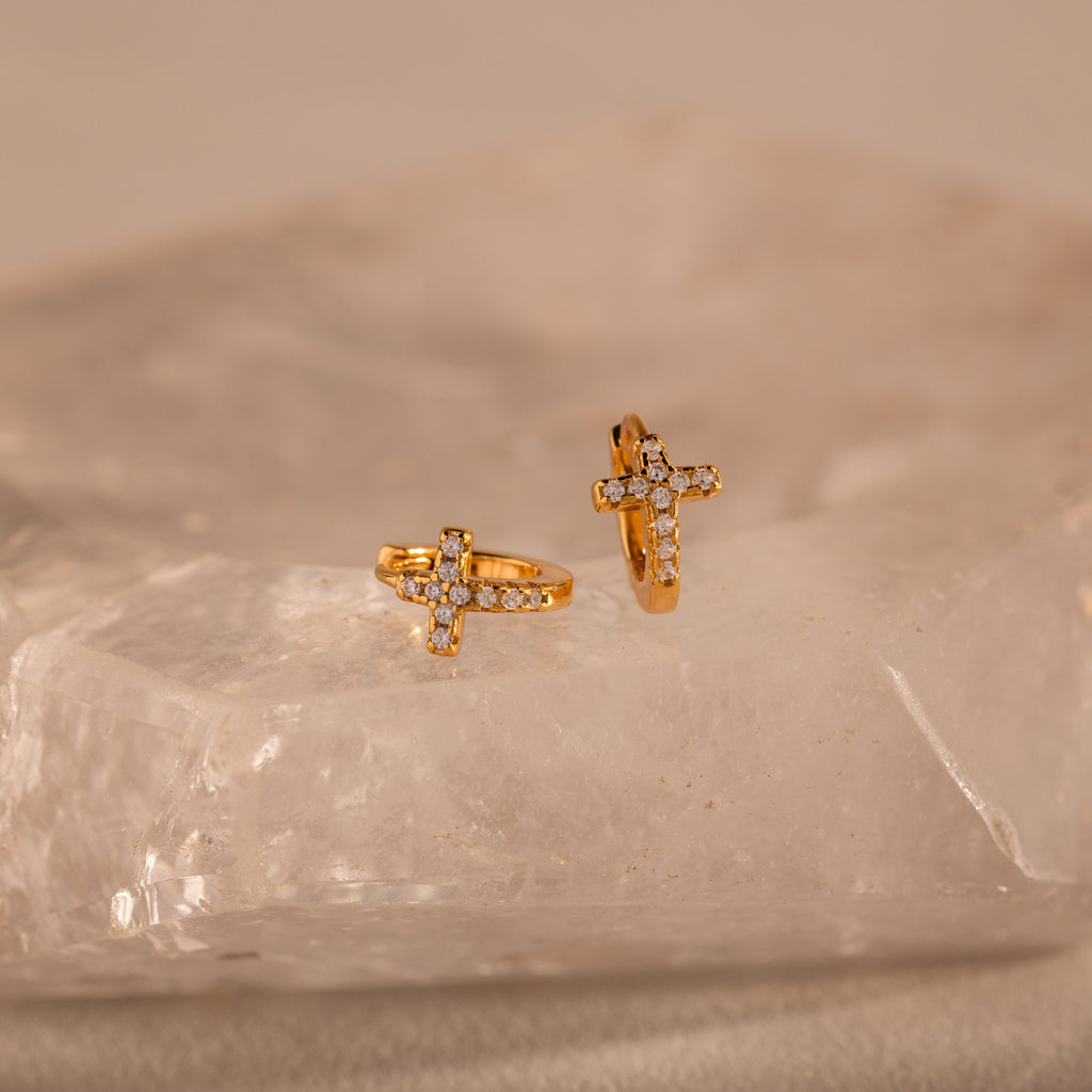 pavé earrings with a timeless symbol