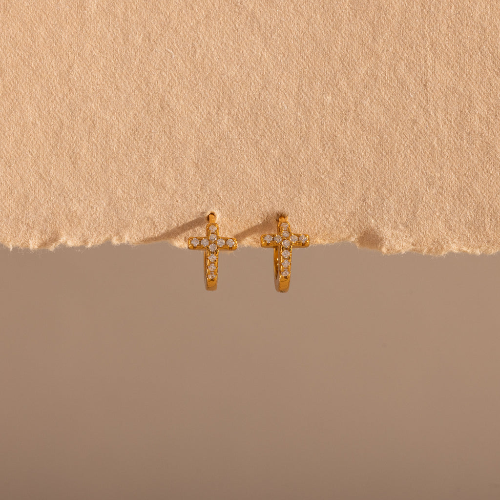 pavé earrings with a timeless symbol
