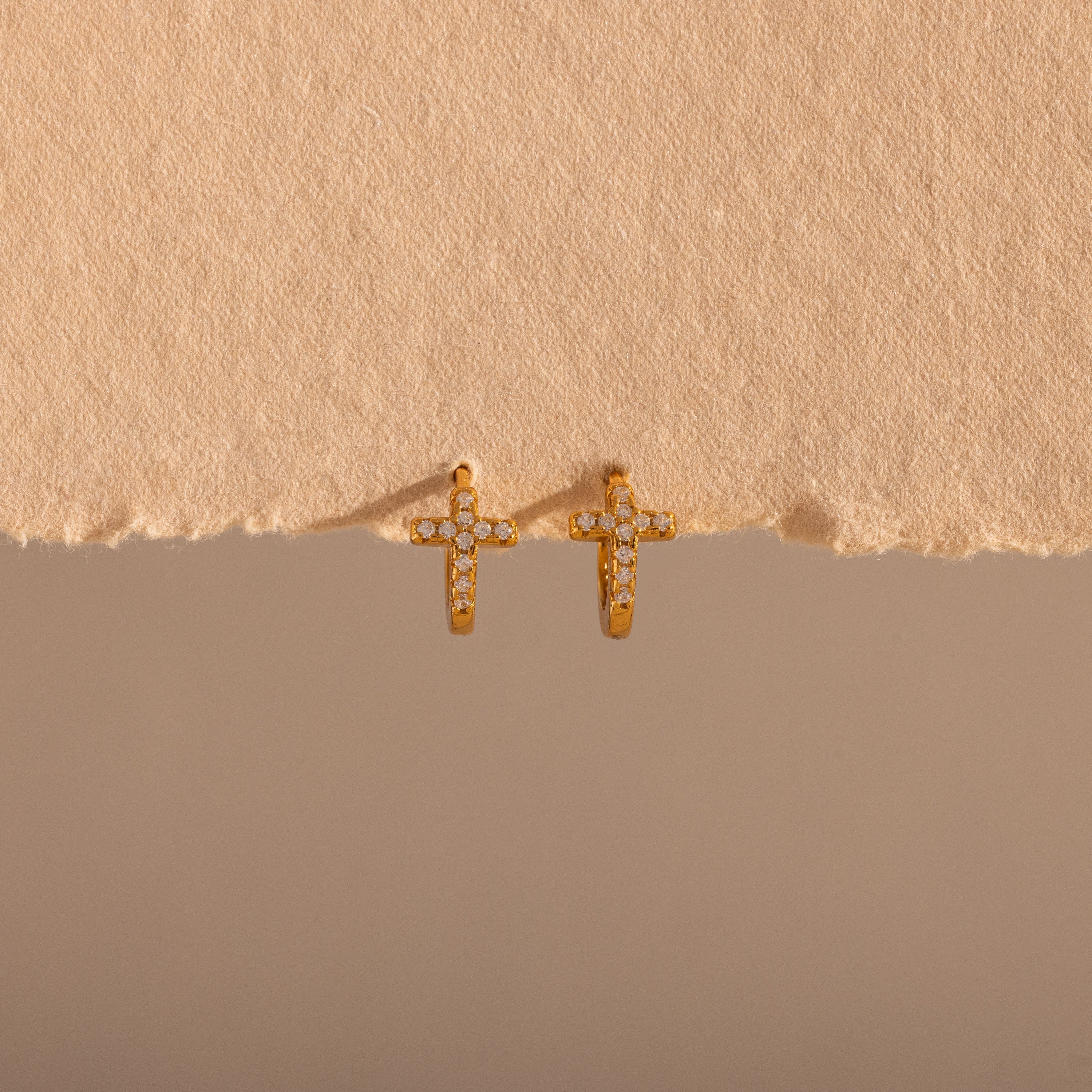 pavé earrings with a timeless symbol