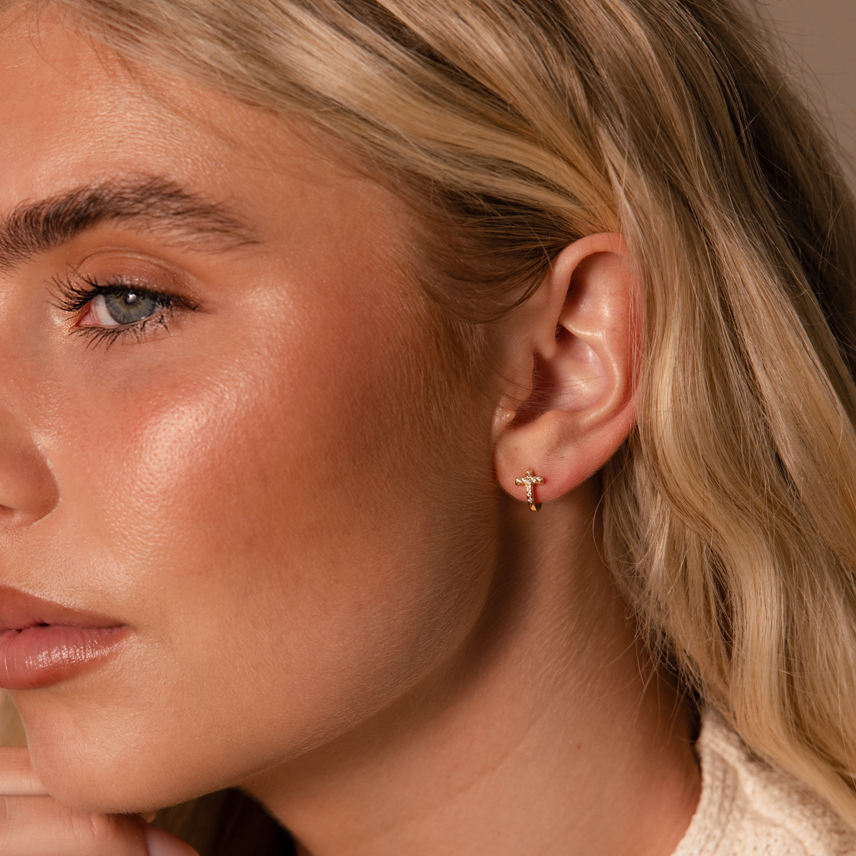 pavé earrings with a timeless symbol