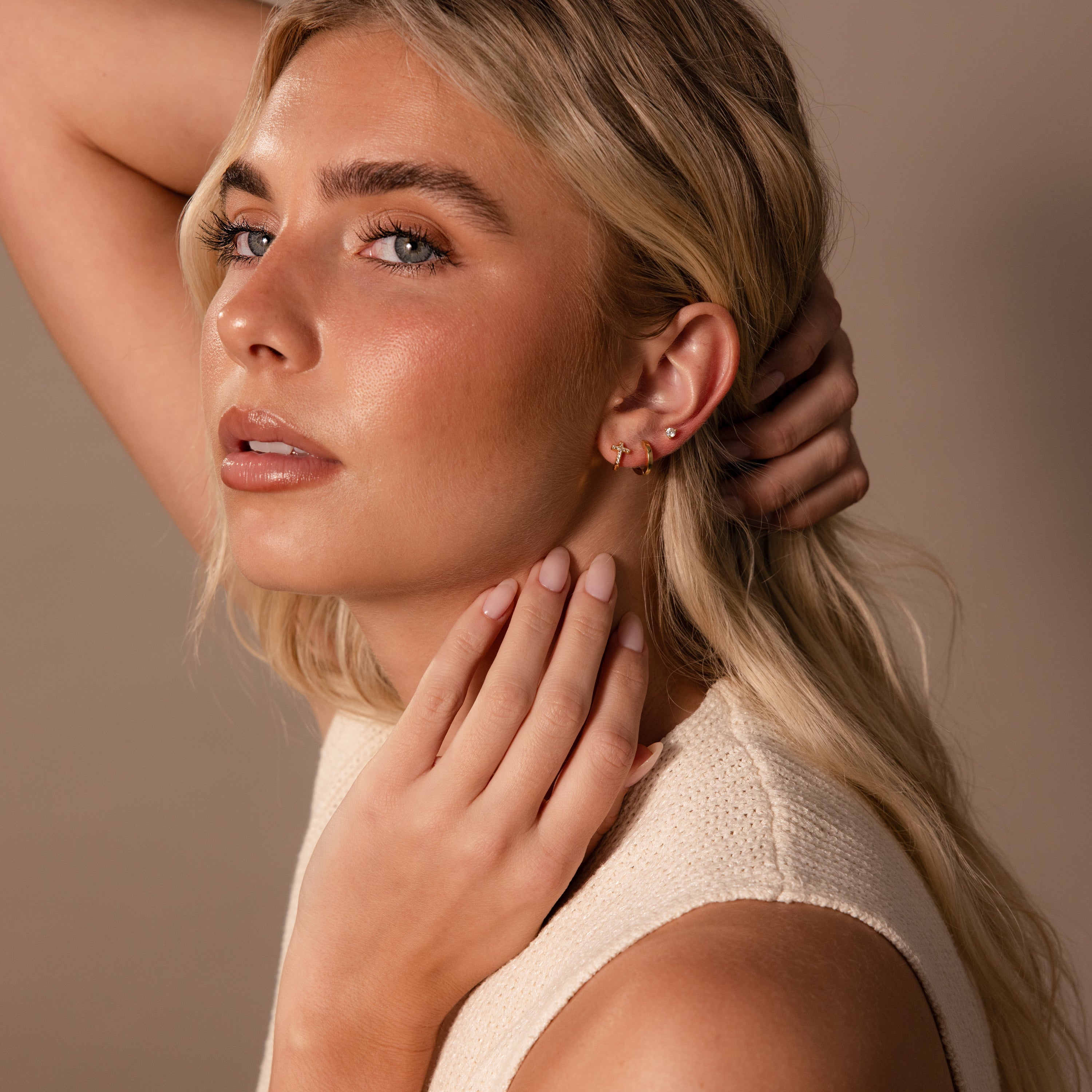 pavé earrings with a timeless symbol