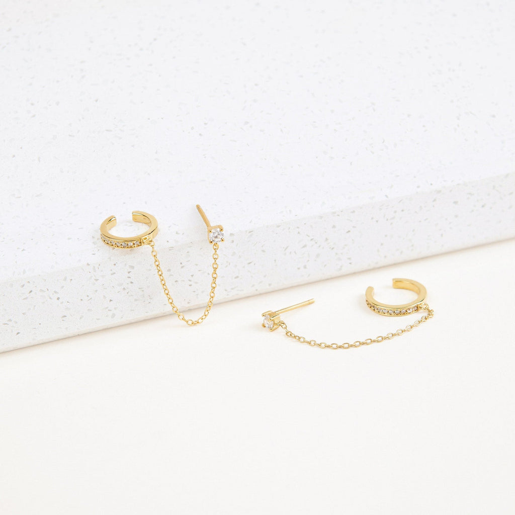 Ivy clip-on earrings with a sparkly chain.
