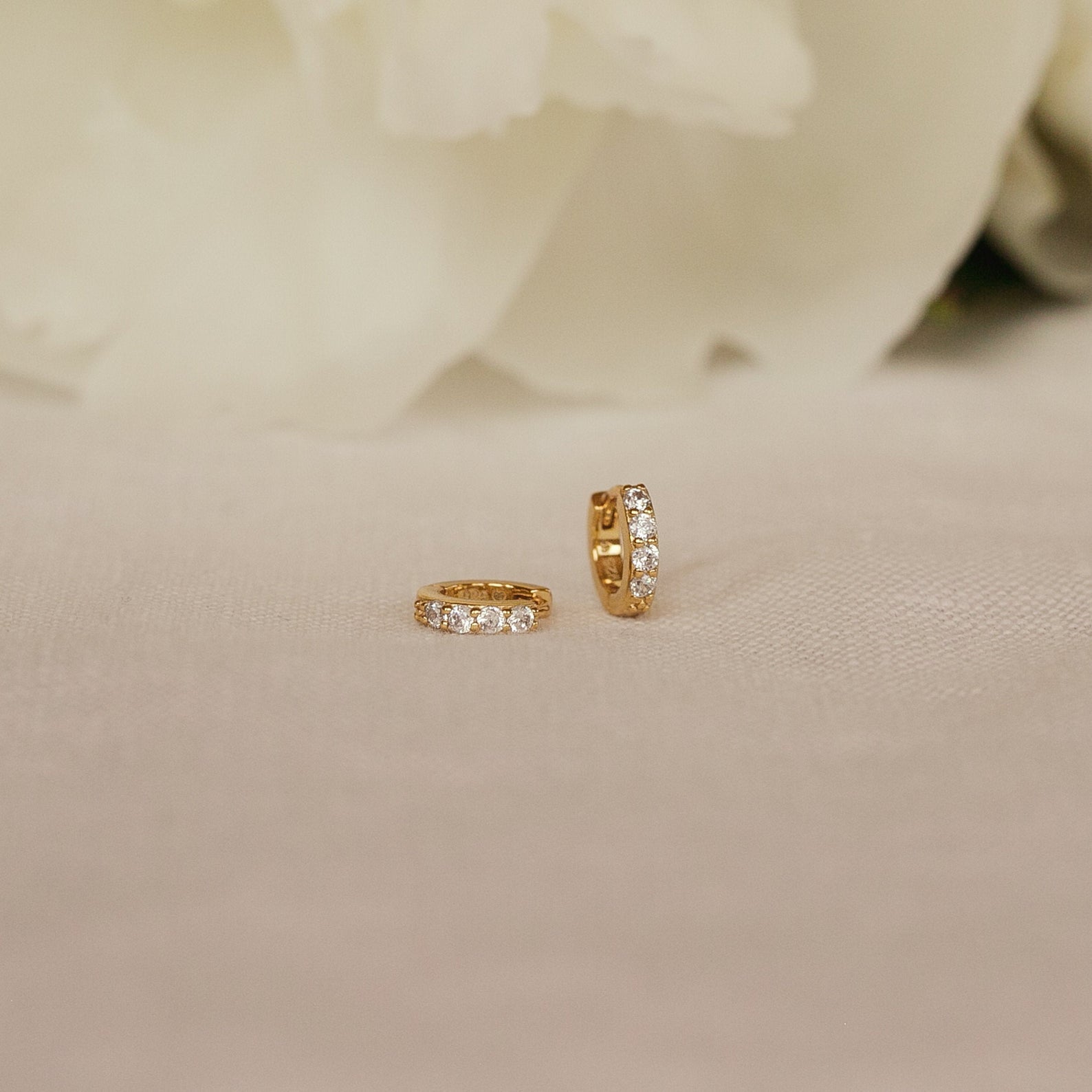 Leah Diamond earrings in 18k gold.