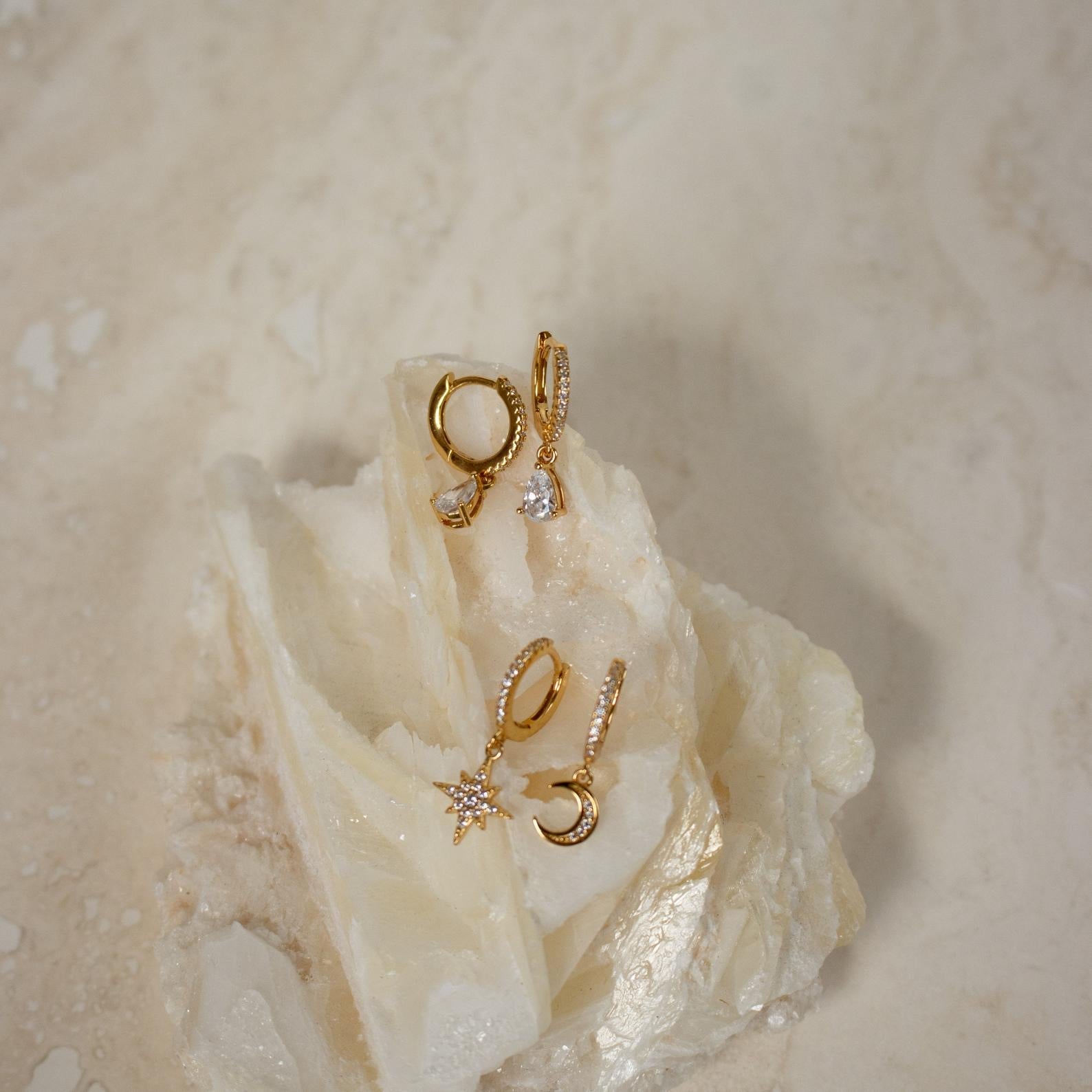 Stunning hoop earrings studded with diamonds.
