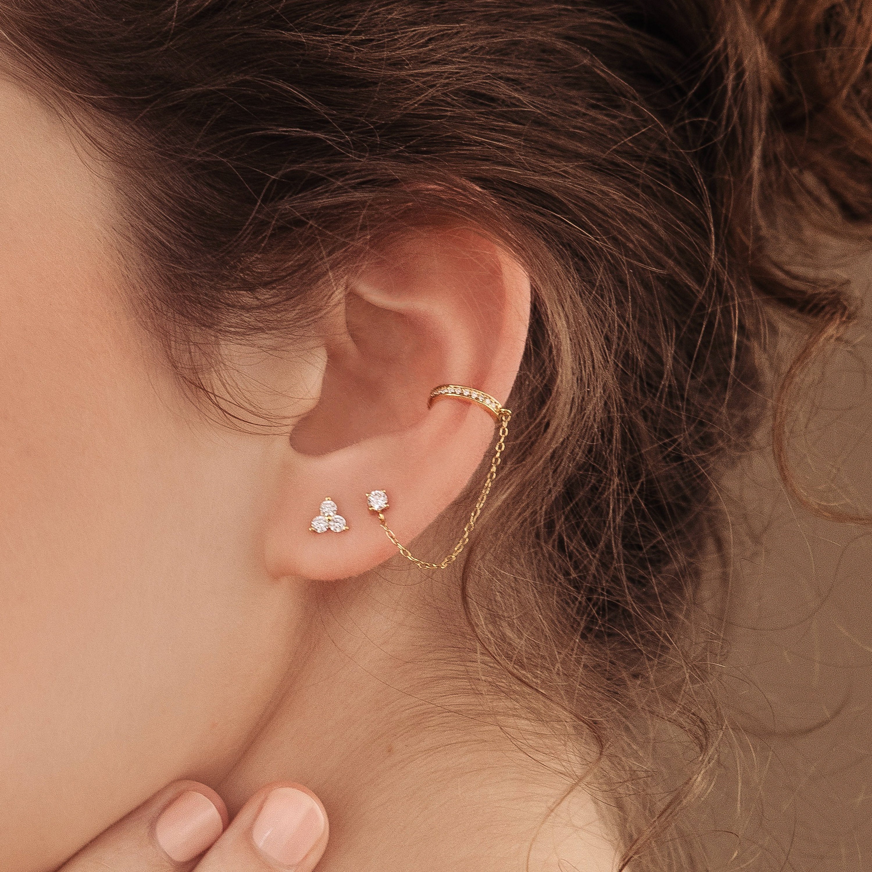 Ivy clip-on earrings with a sparkly chain.