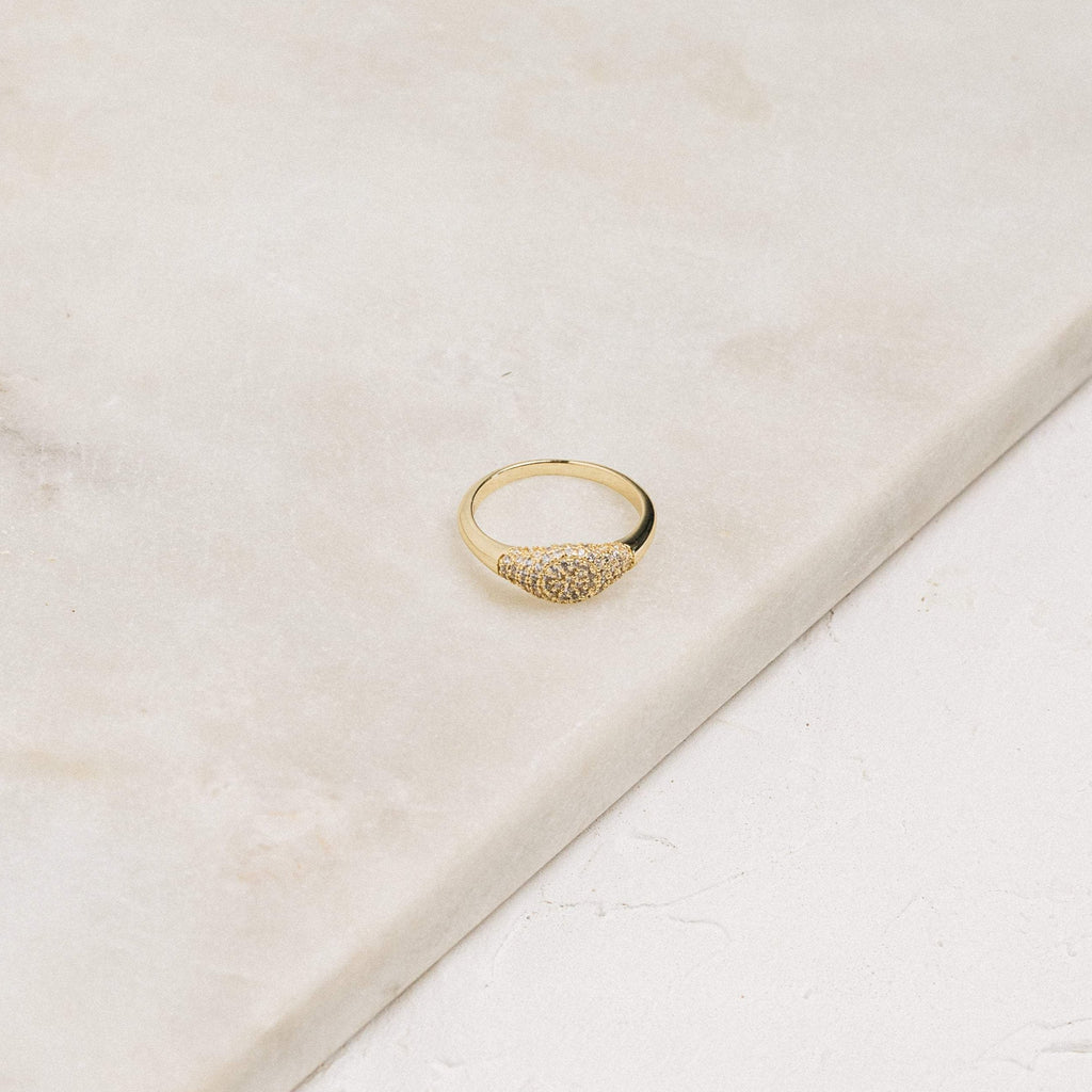 Ring with a studded surface