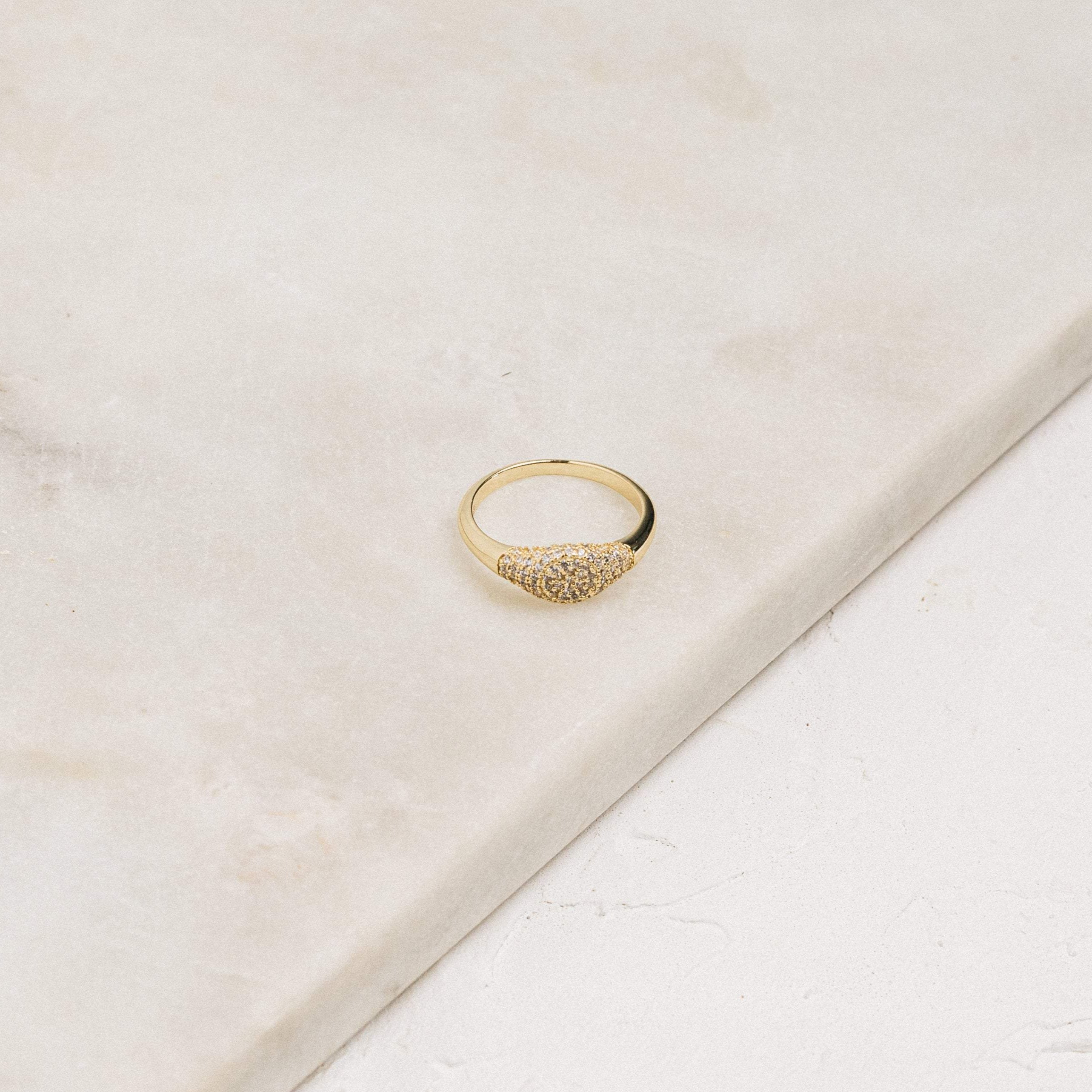 Ring with a studded surface