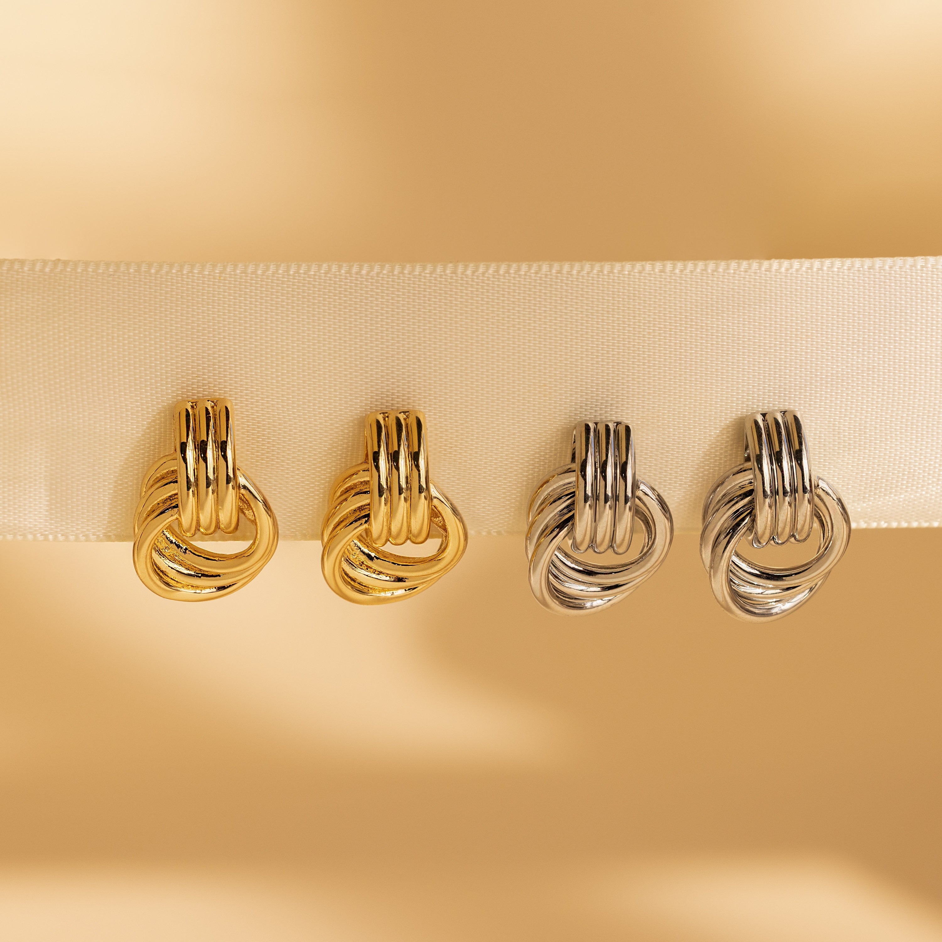 Knot earrings made of EVA foam.
