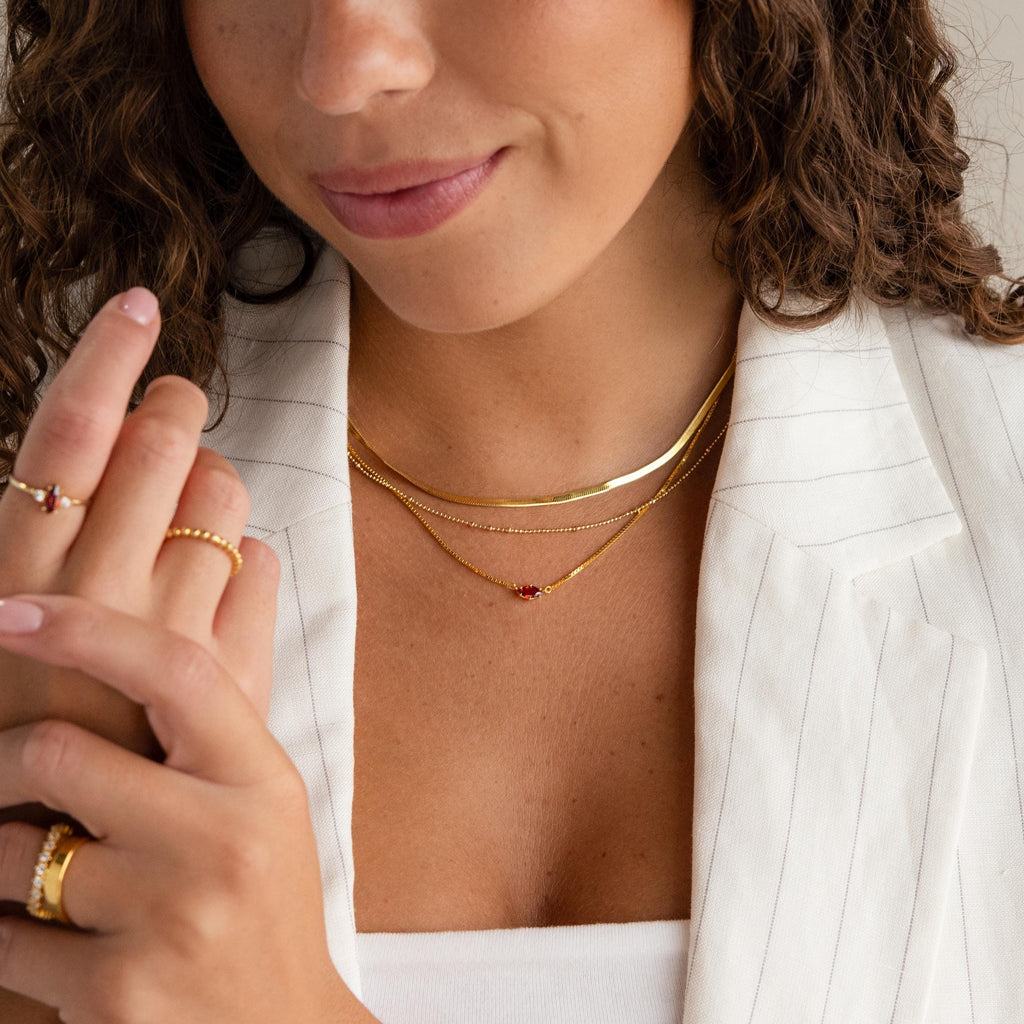 Subtle necklace with Aline's birthstone.