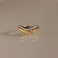 Duo of rings with faceted stones, metallic duet.