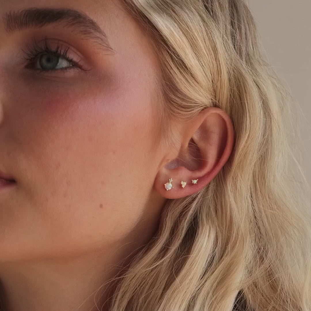 Harmony earrings with opal and diamond.