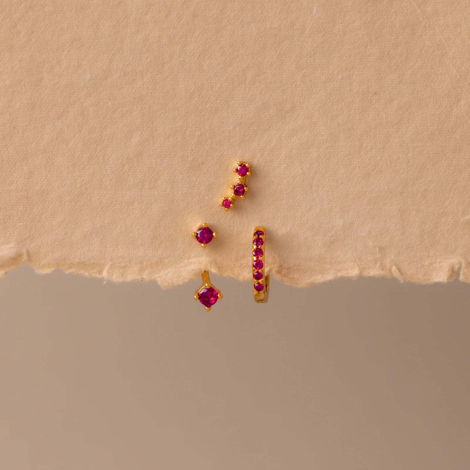 Set of colorful earrings with sparkling stones.